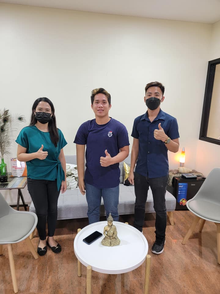 Daga (left) and Salcedo (right) with Jimboy Delarama (middle), who received above-elbow prosthesis from the ECC on February 9, 2022.